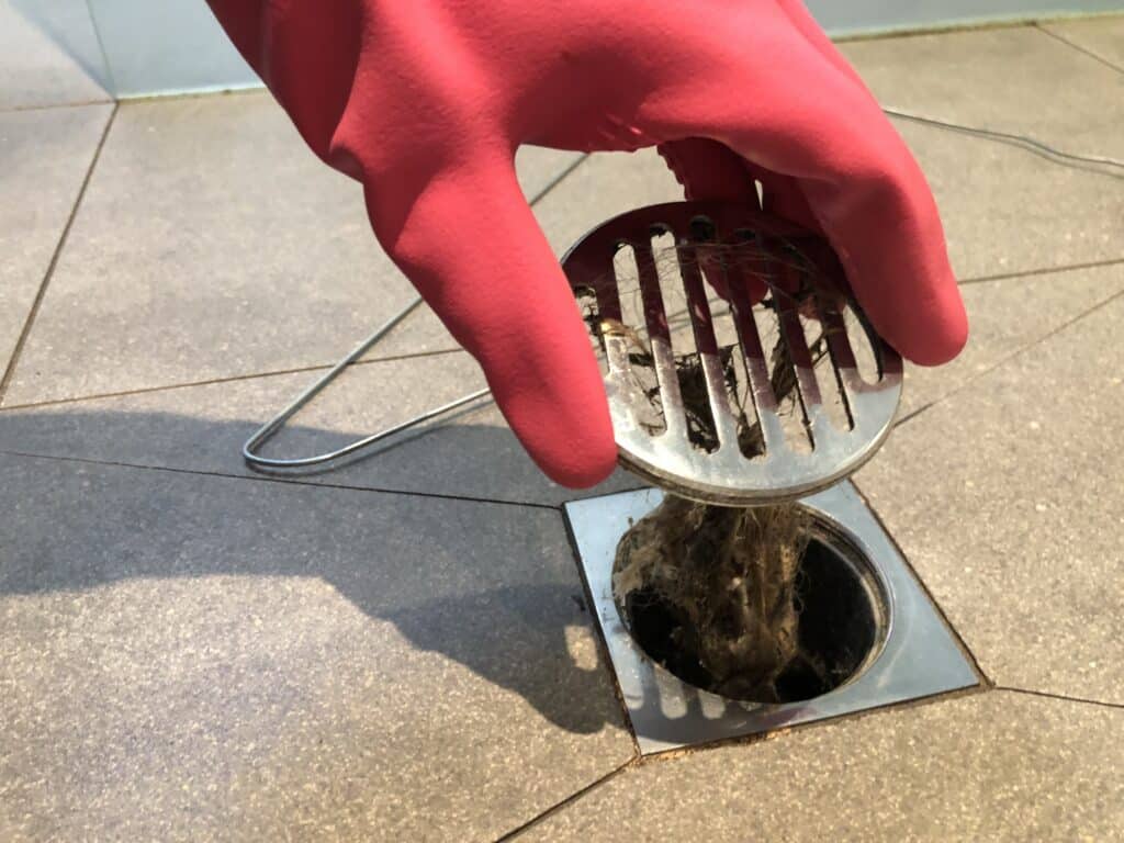 Buildup pulled from shower drain